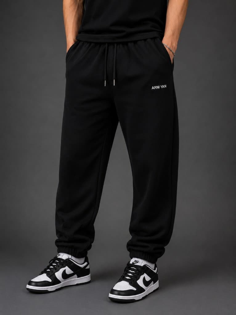 ARMYAN Black Cuffed Joggers Front View